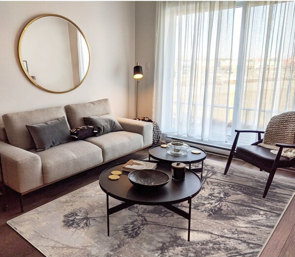 Sivo-krem vuneni tepih 133x180 cm Lissey – Agnella