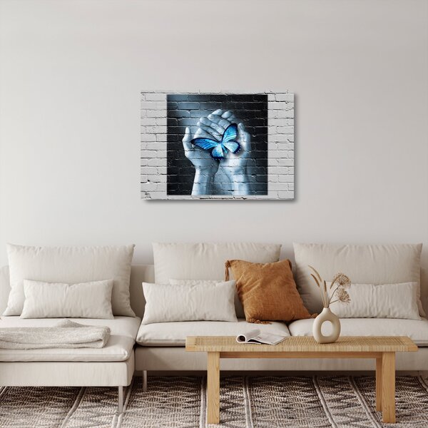 Staklena slika plavog leptira na zidu (70x50 cm)