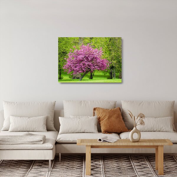 Staklena slika cvjetajućeg stabla na livadi (70x50 cm)