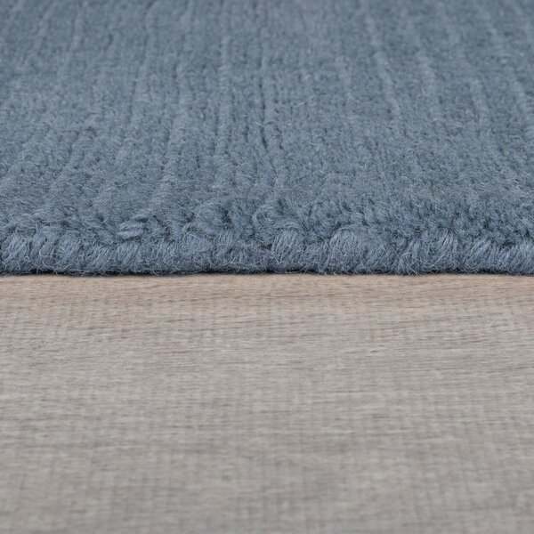 Tamno plavi ručno rađen vunen tepih 120x170 cm Textured Wool Border – Flair Rugs
