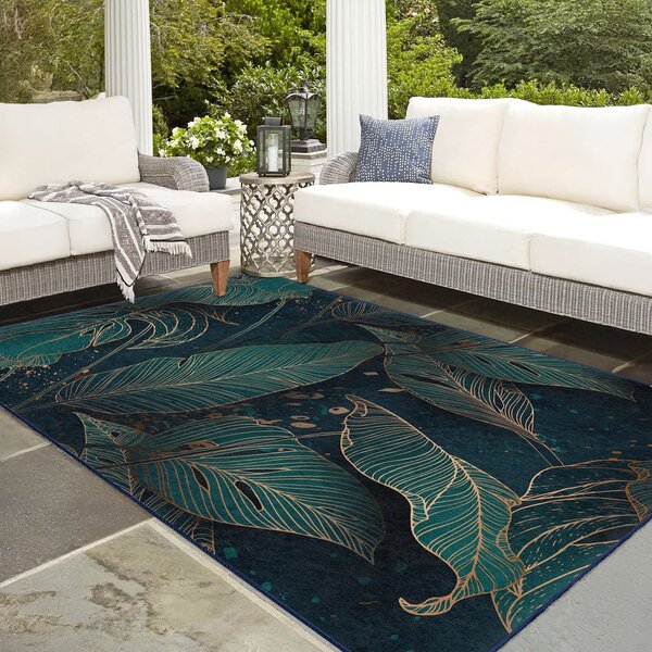 Petrolej zeleni perivi tepih 160x230 cm Midnight Jungle – Mila Home