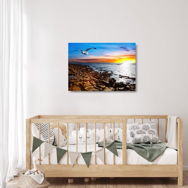 Staklena slika - Galeb leti iznad obale (70x50 cm)