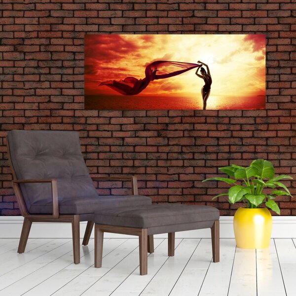 Slika - Silhueta ženske ob sončnem zahodu (120x50 cm)