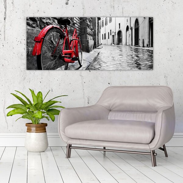 Slika rdečega kolesa na tlakovani ulici (120x50 cm)