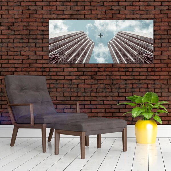 Slika aviona između zgrada (120x50 cm)