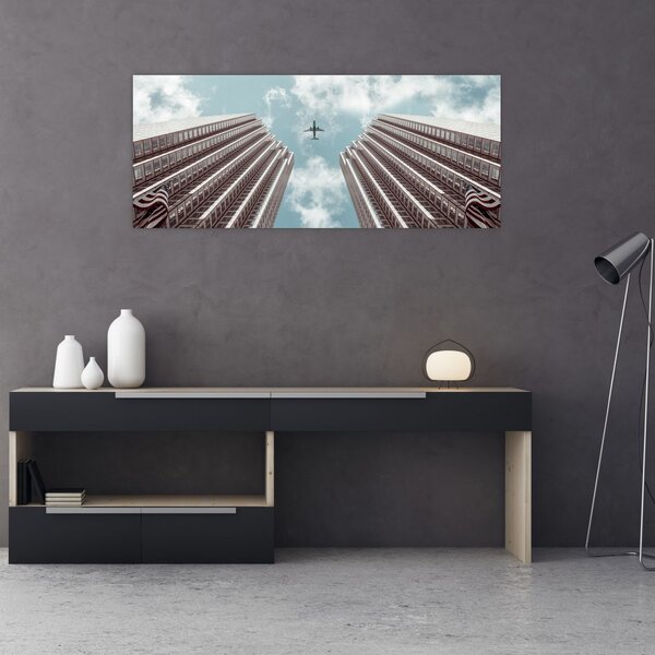 Slika aviona između zgrada (120x50 cm)