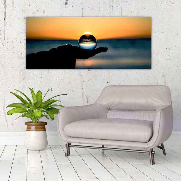 Slika staklene kugle u dlanu (120x50 cm)