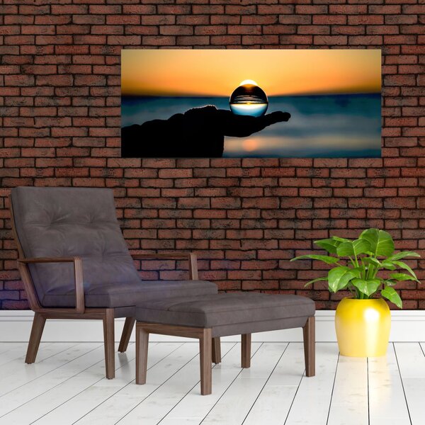 Slika staklene kugle u dlanu (120x50 cm)