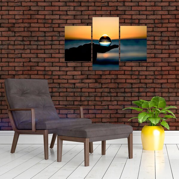 Slika staklene kugle u dlanu (90x60 cm)
