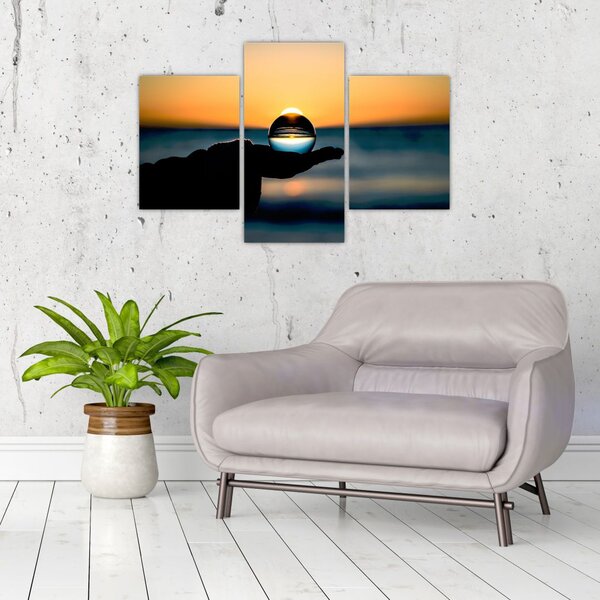 Slika staklene kugle u dlanu (90x60 cm)
