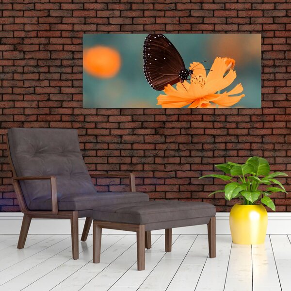 Slika - leptir na narančastom cvijetu (120x50 cm)