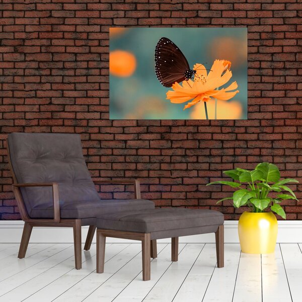 Slika - leptir na narančastom cvijetu (90x60 cm)