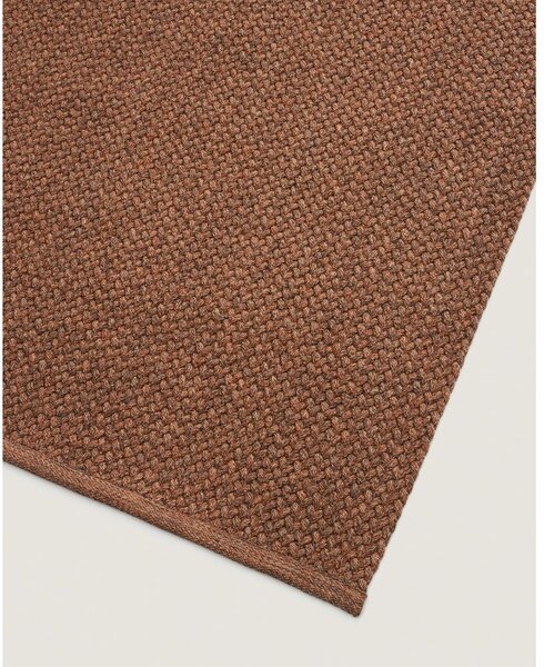Unutarnji i vanjski tepih od recikliranih vlakna boje terakote 160x230 cm Despas – Kave Home