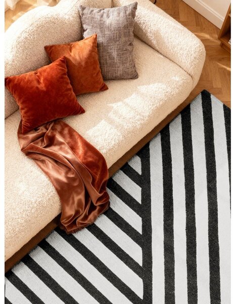 Crno-bijeli ručno rađen vunen tepih 120x180 cm Stryve Noir – Elle Decoration