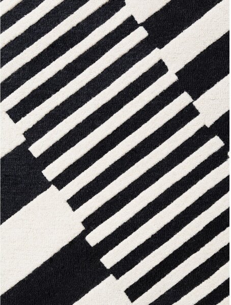 Crno-bijeli ručno rađen vunen tepih 120x180 cm Stryve Flux – Elle Decoration