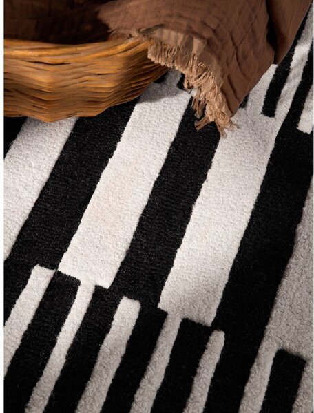 Crno-bijeli ručno rađen vunen tepih 120x180 cm Stryve Pulse – Elle Decoration