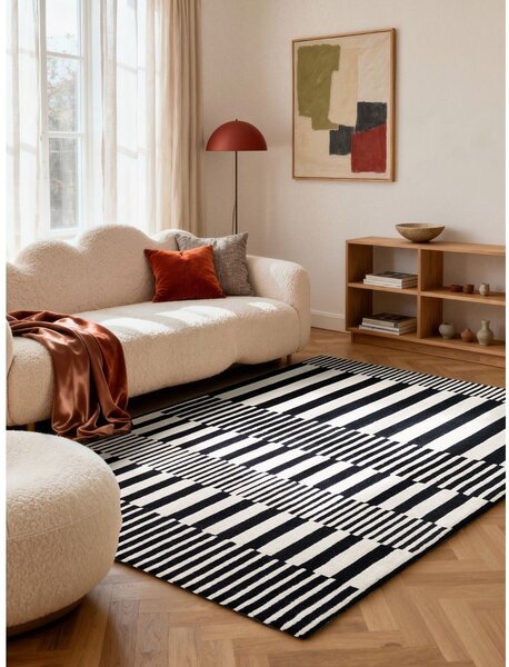 Crno-bijeli ručno rađen vunen tepih 120x180 cm Stryve Pulse – Elle Decoration