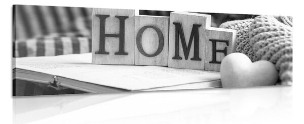 Slika s natpisom Home i mrtvom prirodom u crno-bijelom dizajnu