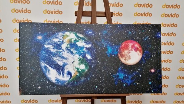 Slika planet Zemlja i crveni Mjesec