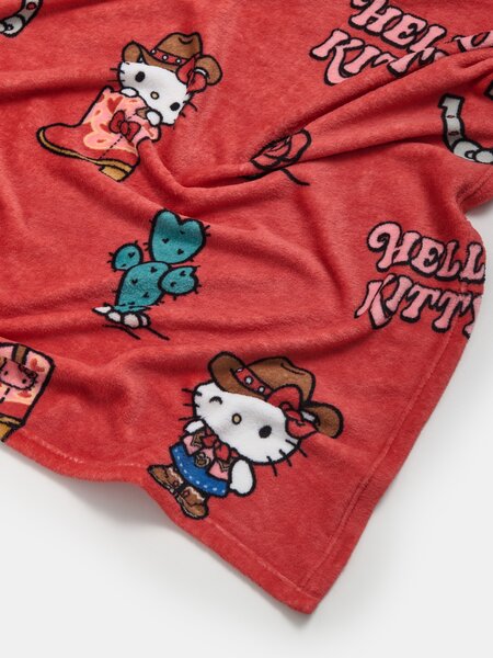 Sinsay - Deka s motivom kauboja Hello Kitty